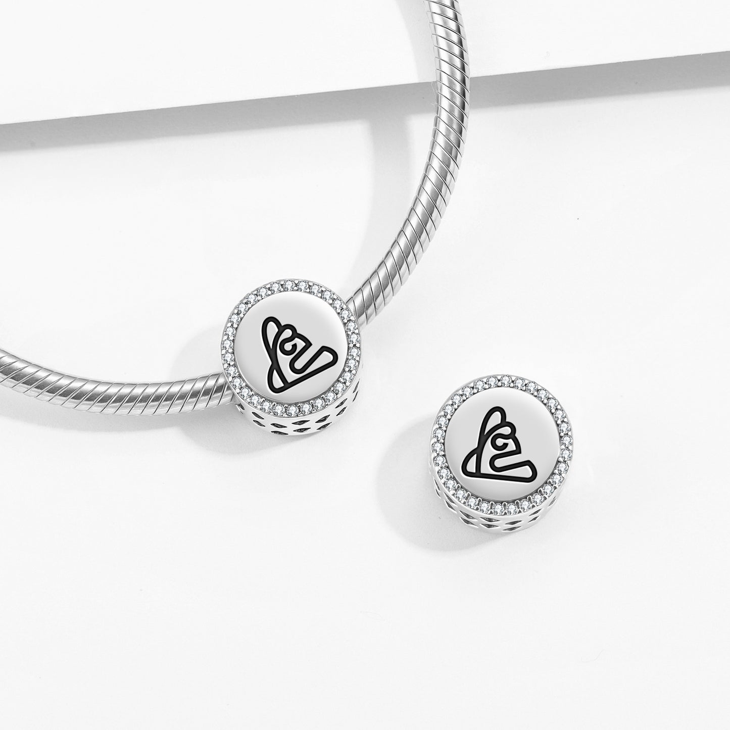 Trigonolito Taino Symbols Charm